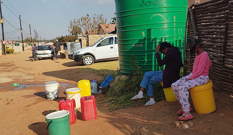 Empty water containers in the street tell the story of Siyanqoba’s ongoing water crisis in Emalahleni Local Municipality. Photograph: Rodney Hlatshwayo