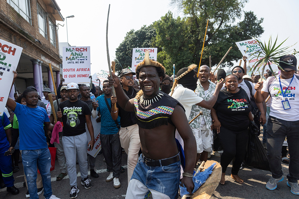 March and March protesters make their way to the Home Affairs office on Che Guevara Road, where foreign nationals have been living on the street for months, in Durban, South Africa, on 10 September 2026. Photo: Rogan Ward/Daily Maverick